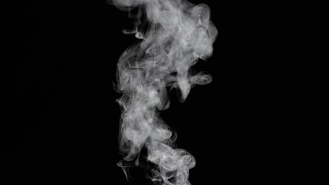 smoke spraying up on black background