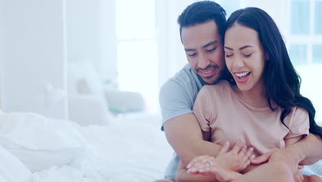 Couple-in-bed,-hug-and-engagement