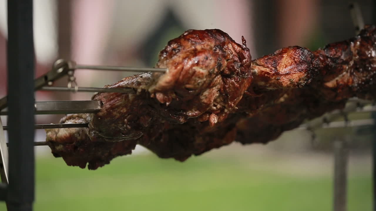 Steak on the grill with flames. Large piece of fresh beef meat prepared on a grill pan