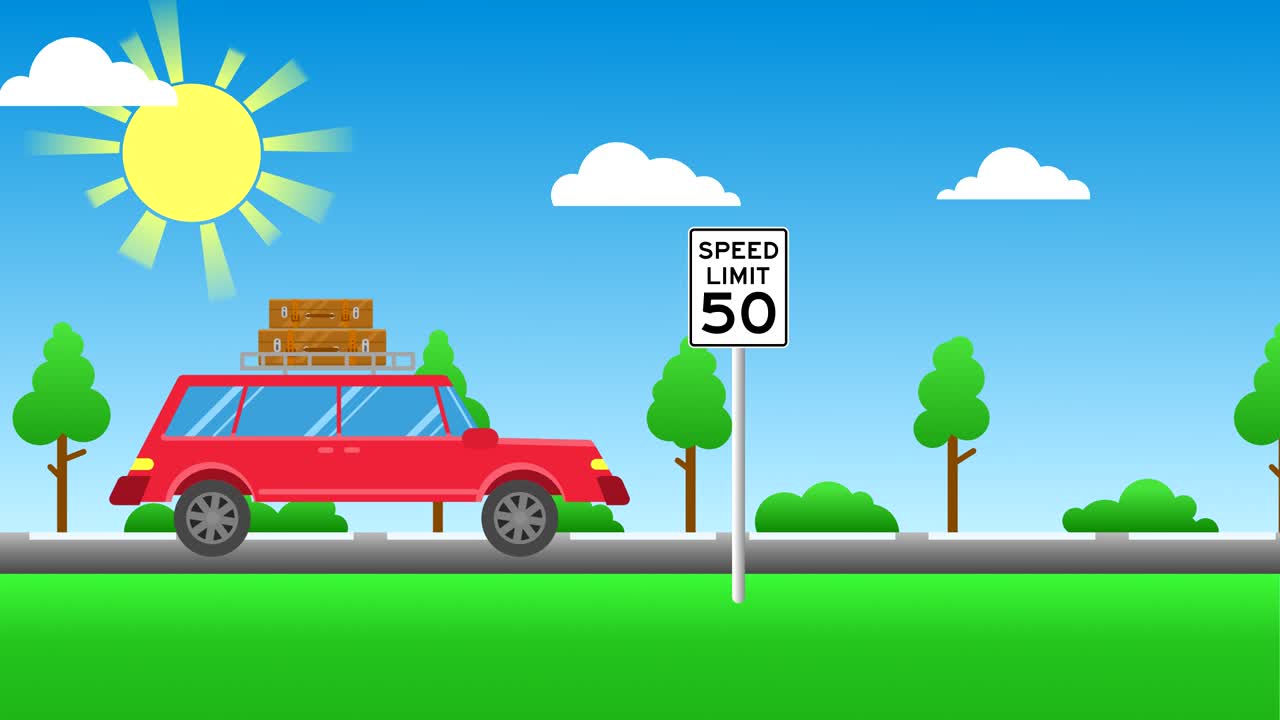 짐이 있는 빨간 차가 길을 따라 달리고 있다.