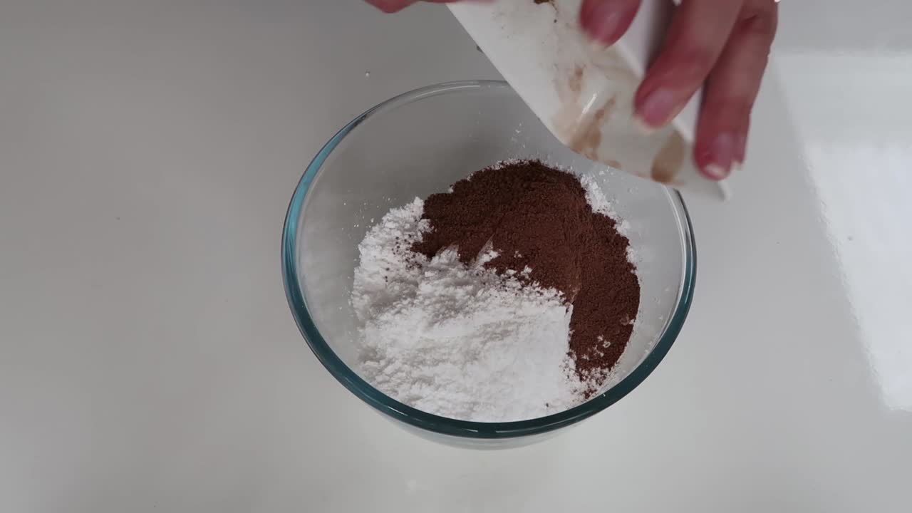 Mixing cocoa and icing sugar