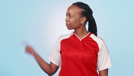 Pointing,-face-and-black-woman-on-a-studio