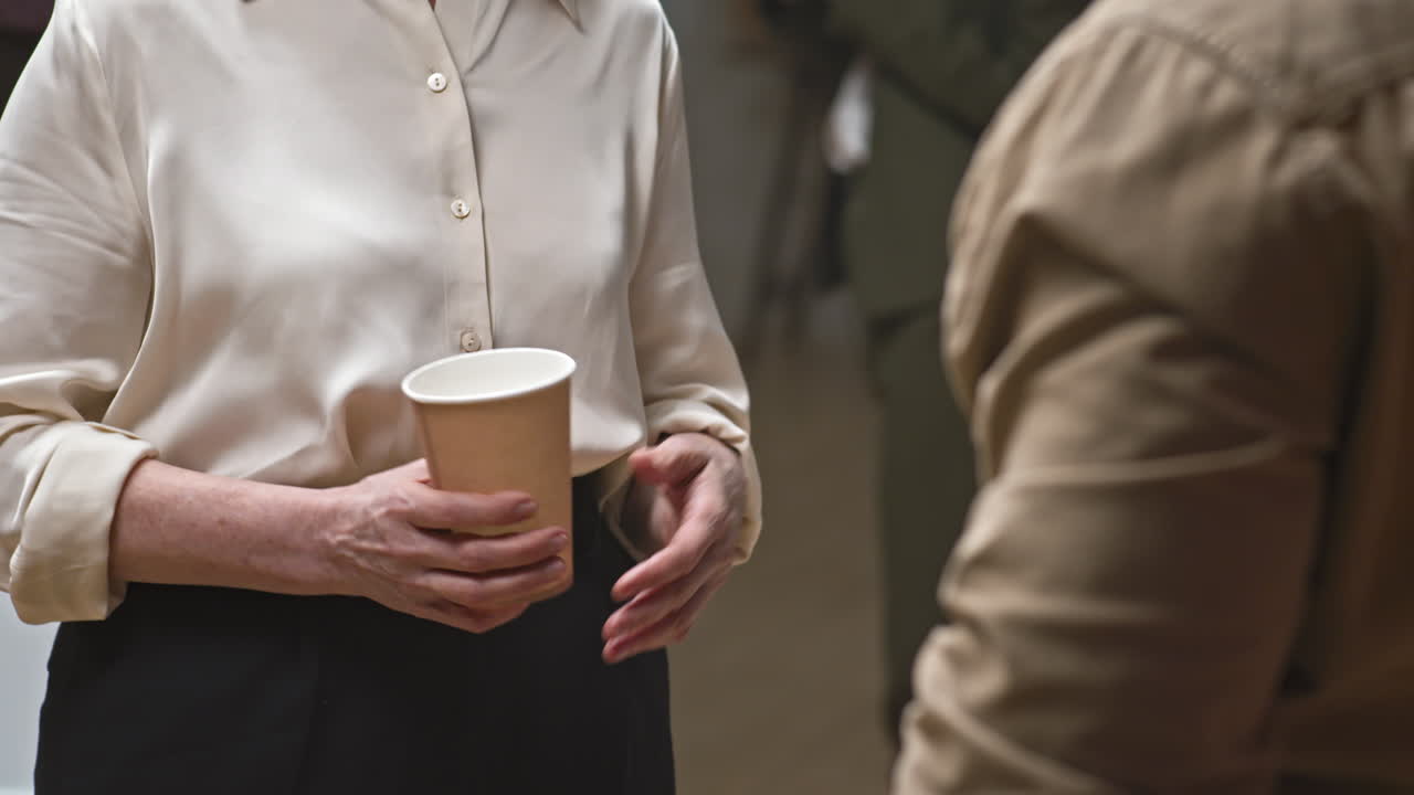 Multi-Ethnic Man and Woman Talking at Mental Support Group Meeting