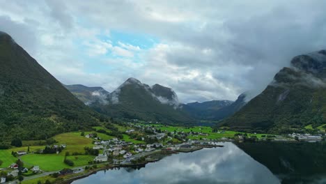 aerial over syvde on a cloudy day, vanylven municipality, norway