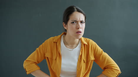 woman with a displeased expression