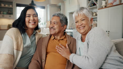 Face-of-woman-with-her-senior-parents-on-a-sofa