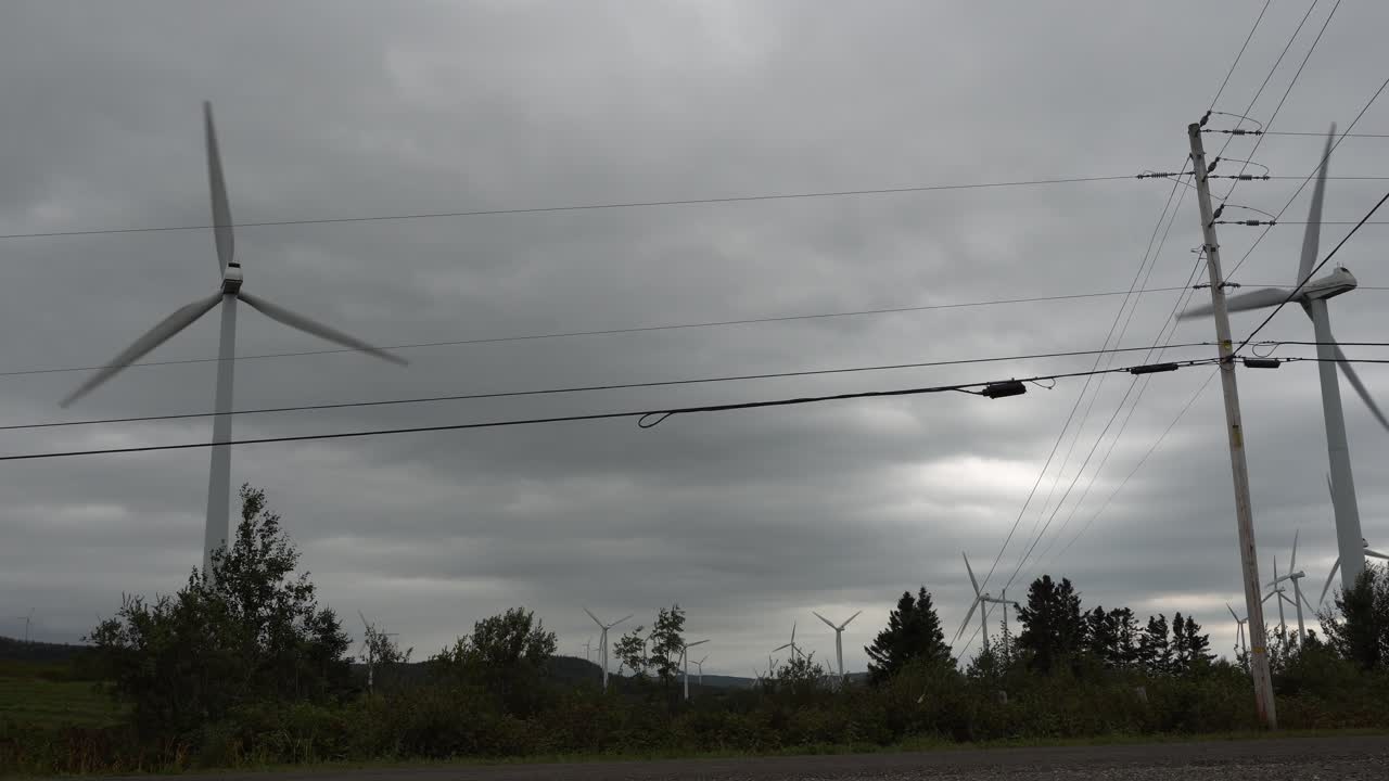 A ground of wind turbines working in symbiosis to bring electricity for communities in Gaspesie, Quebec