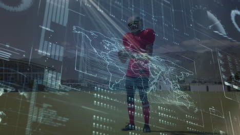 football player standing on green turf, projecting sports analytics panels and world map data