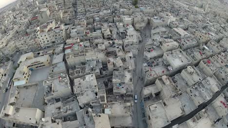 aerial shot of syria ruined buildings and streets