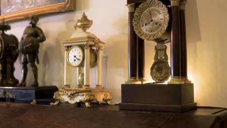 smooth-boom-jib-shot-reveal-of-golden-wooden-plated-vintage-antique-clocks-old-fashioned-refurbished-mysterious-thriller-scary-house