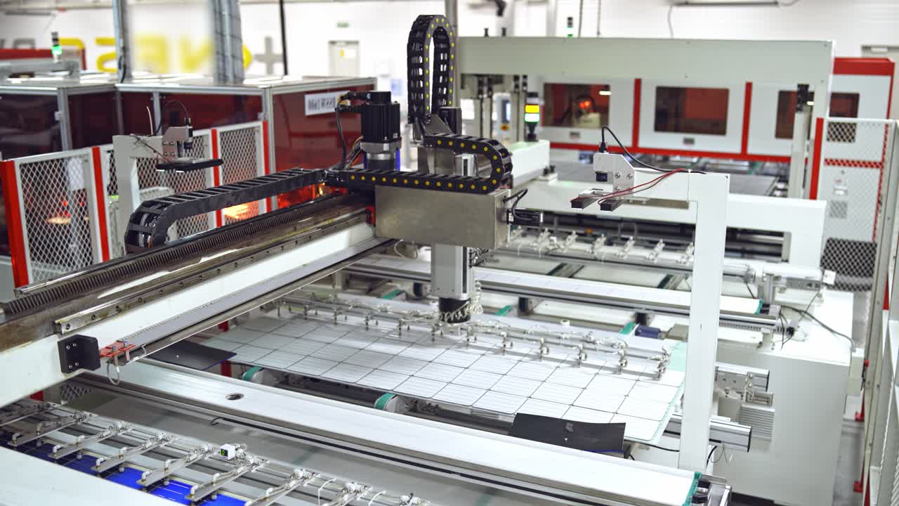 Robotic equipment for producing solar panels. Automated manufacturing of solar cells in a modern factory.