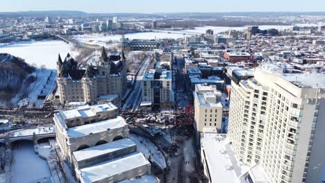 aerial view of freedom convoy protesters blocking the streets around the fairmont chateau laurier in ottawa, canada