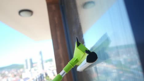 window cleaning with a squeegee tool