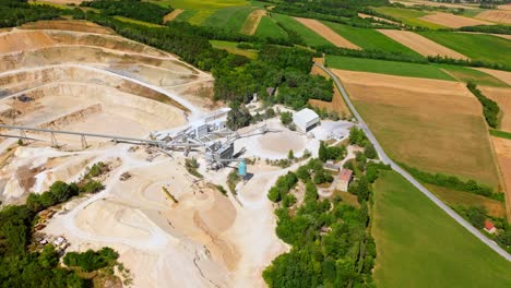 Lime-Stone-Quarry,-Large-Open-pit-Mine---aerial-drone-shot
