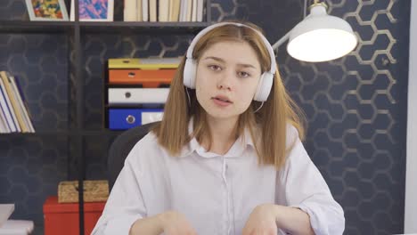 happy young business woman looking at webcam making remote online video conference call.