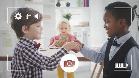 taking photos of boys shaking hands on a digital camera