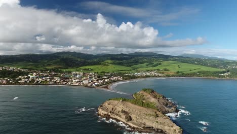 aerial drone shot over tombolo in martinique. sainte marie zoom out