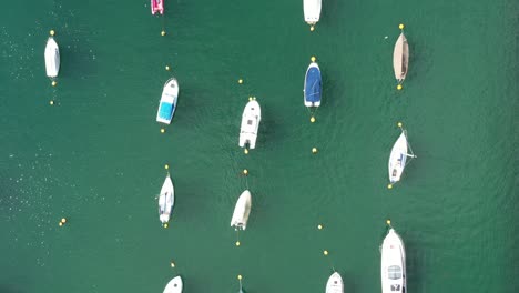 top down aerial view of boats moored on the river fowey, in south cornwall, uk