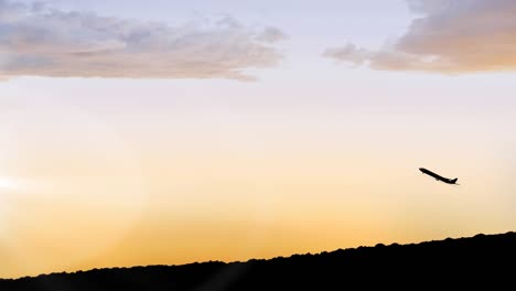 animation of silhouetted plane taking off over field and orange sky at sunset