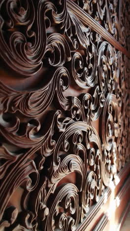 intricate wood carving panel detail