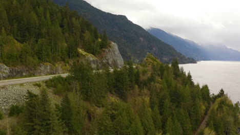 Aerial-view-flying-along-the-rugged-Pacific-Coast-in-British-Columbia,-Canada