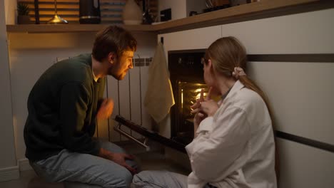 couple cooking together in the kitchen