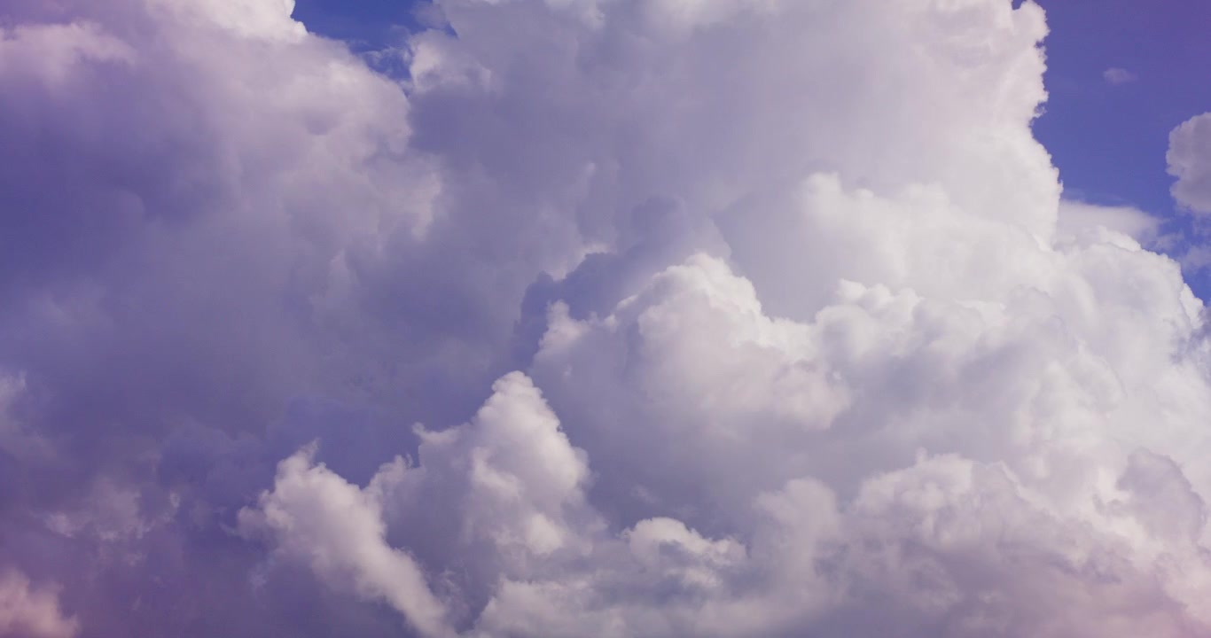 Dynamic Time Lapse of Fluffy White Clouds in a Blue Sky