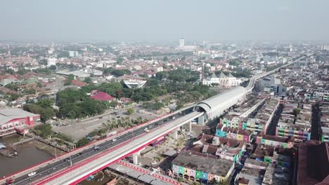 ampera public train station, monpera and the great mosque of palembang city