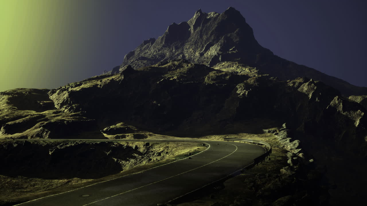 Winding road leads to a towering mountain in twilight light