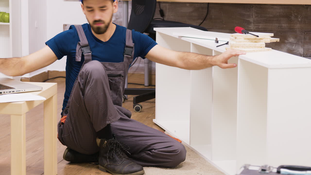 Man assembling furniture