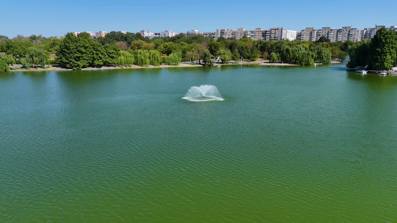 Closeup Aerial View of an Artesian Fountain in the Middle of Tineretului Park's Lake, Bucharest, Romania