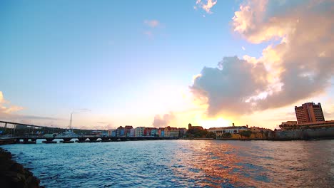 spectacular colourful sunrise at punda in willemstad, curacao