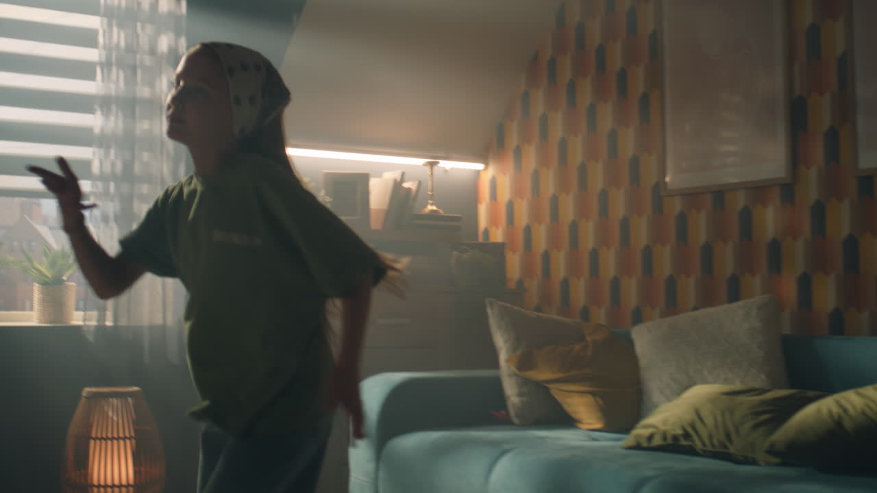 Young Girl Dancing at Home in Spare Time Young Girl Dancing Doing Visual Moves Creating Content for Social Network Spending Leisure Time at Home Admiring yourself Slow Motion