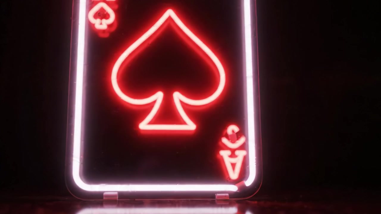 Illuminated Ace of Spades Playing Card: A Mesmerizing Neon Display Capturing the Iconic Symbol of Card Games with Stunning Reflections and Vibrant Color Contrast
