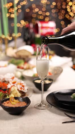 champagne toast at a festive christmas dinner