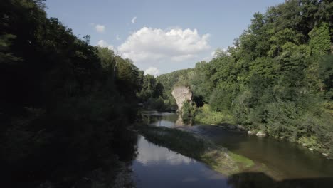 -SHOT:-through,-Sam-Kolder
-DESCRIPTION:-drone-video-over-the-Fiora-river-passing-between-a-bridge-very-close-to-the-water