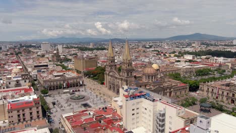 north east side view of guadalajara cathedral and main square with a view of city in jalisco, mexico