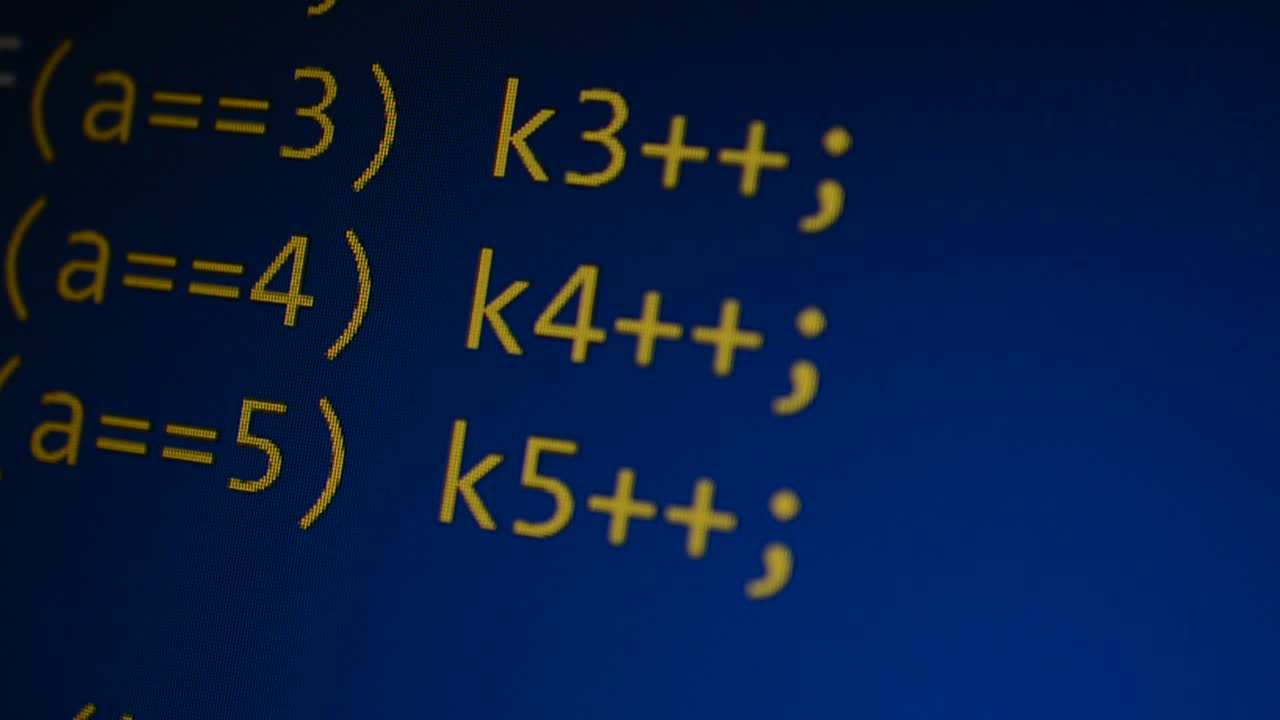 Source code on the monitor screen. Source code