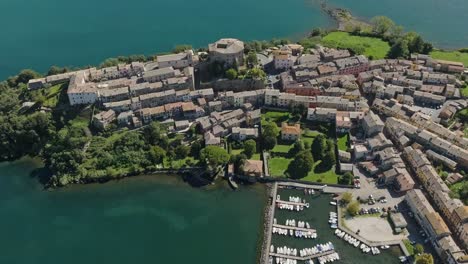 aerial around the old town of capodimonte on lake bolsena, province of viterbo, italy