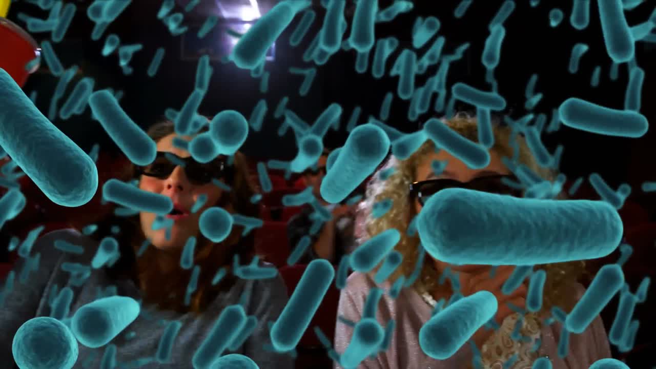 animación de células de covid 19 sobre personas en el cine