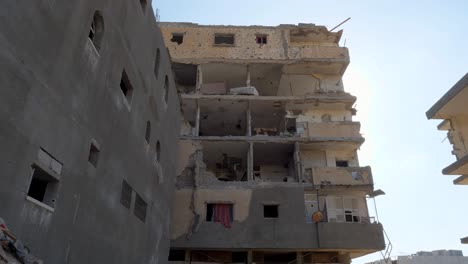 the rubble of collapsed buildings in the city of rafah, palestine due to chaos created by israeli idf troops