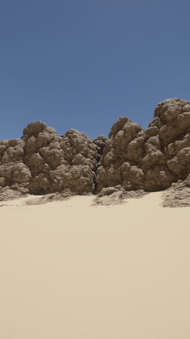 모래 언덕과 바위 형성으로 된 사막 풍경