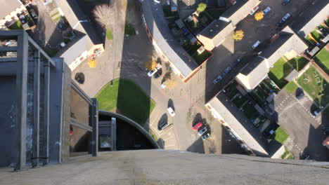 looking down from the top of the national lift tower in northampton when a car drives past