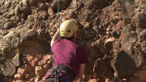 rock climbing on rocky wall