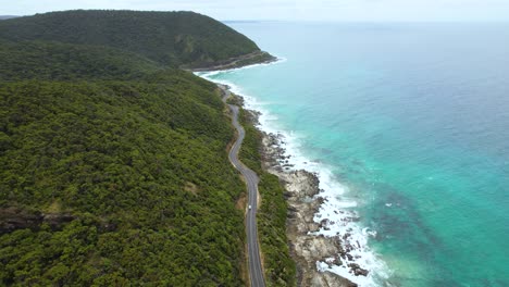 4k drone video of driving along the great ocean road in victoria, australia