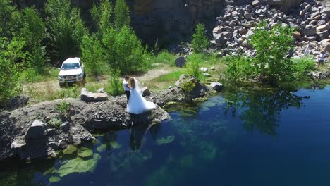 young wedding couple outdoor. aerial shot of a young wedding couple outdoor. groom and bride together