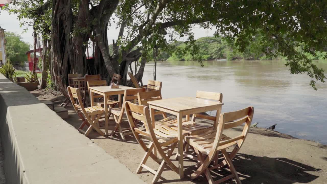 Riverside Cafe with Wooden Furniture