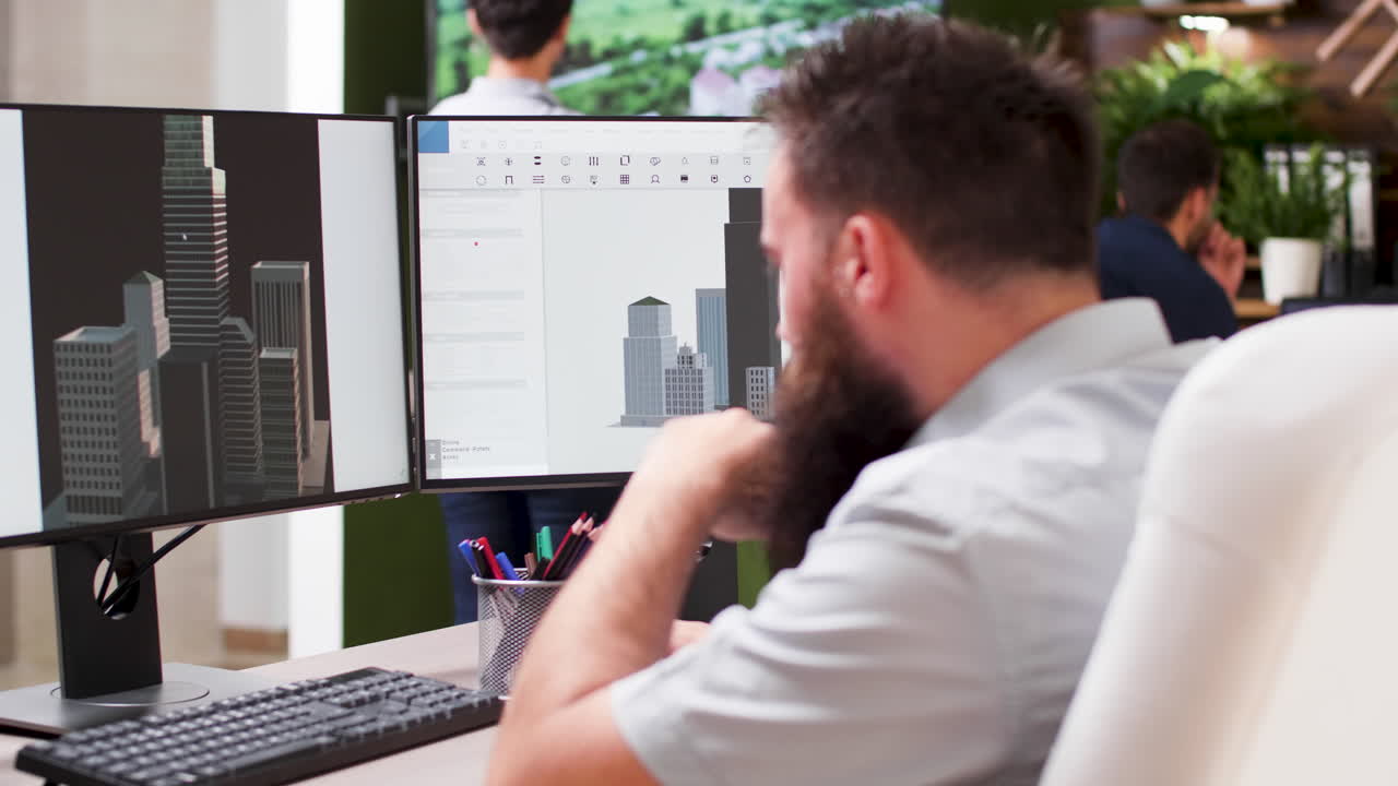 Man working on 3D architecture design on computer