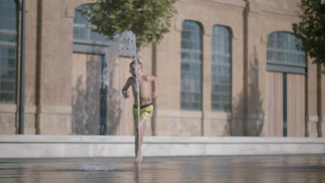 running through a fountain jet