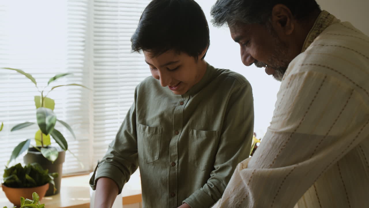Grandfather and Grandson Cooking and Baking Together